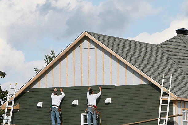 Professional Storm Damage Siding Repair technician working in West Alexandria, OH